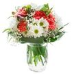 This cheerful mixed bouquet, designed with Potters Bar's community warmth in mind, radiates a sense of easy joy and approachable elegance. Lush, coral-pink carnations stand at the heart of the arrangement, their velvety, ruffled blooms glowing with movement and promise. Crisp white daisies and plush chrysanthemums ring them, the striking yellow-green centers and soft petals evoking early spring meadows along Mutton Lane. Airy gypsophila, or baby's breath, floats between the larger flowers, softening contours and inviting the eye to linger on every delicate detail. From one side, closed magenta alstroemeria buds offer intriguing pops of color and the suggestion of imminent bloom. The bouquet is circled by an embrace of rich green foliage: broad, glossy leaves and slender blades creating a beautifully natural frame and imparting a grounded, organic look. All sit arranged in a simple, transparent glass vase, where the fresh green stems glimmer beneath the water. Against a clean white backdrop, the bouquet's vivid hues and textures become the singular focus. Exuding optimism, comfort, and local charm, this arrangement would be ideal for brightening a birthday, celebrating a milestone, or simply expressing heartfelt appreciation to someone in Potters Bar. Each element is thoughtfully chosen and composed, making the bouquet both visually stunning and deeply meaningful.